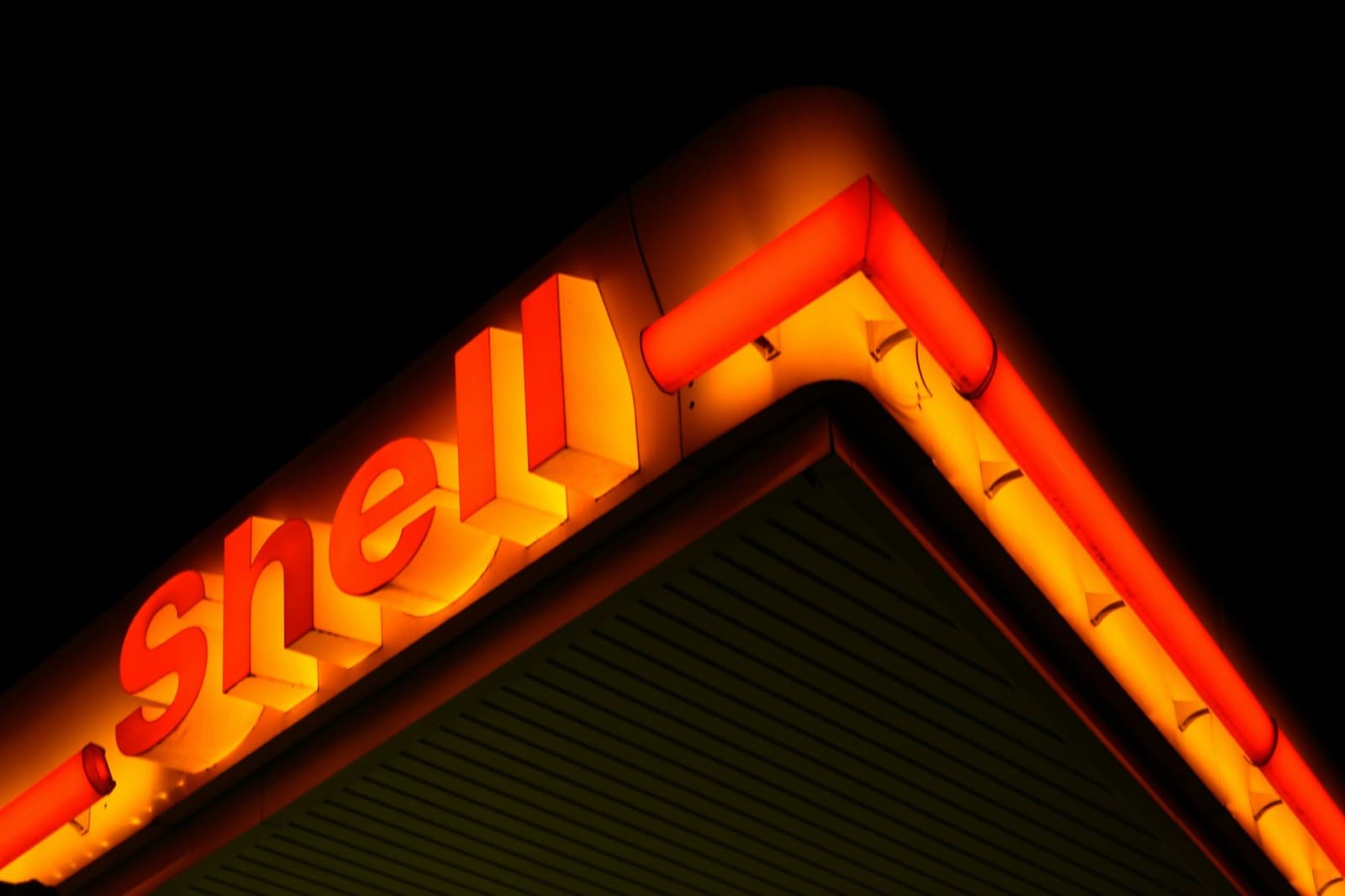 Fuel station forecourt at dusk