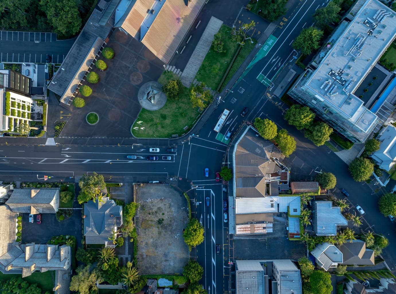 Vehicles moving through a city street
